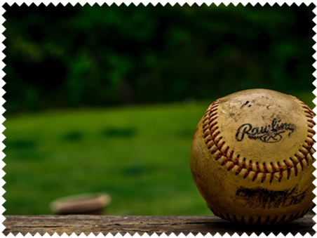 Old baseball with blurred background